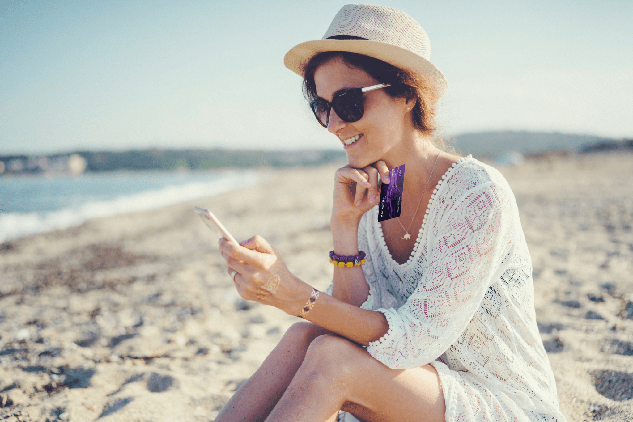 Woman with Signature Card on beach