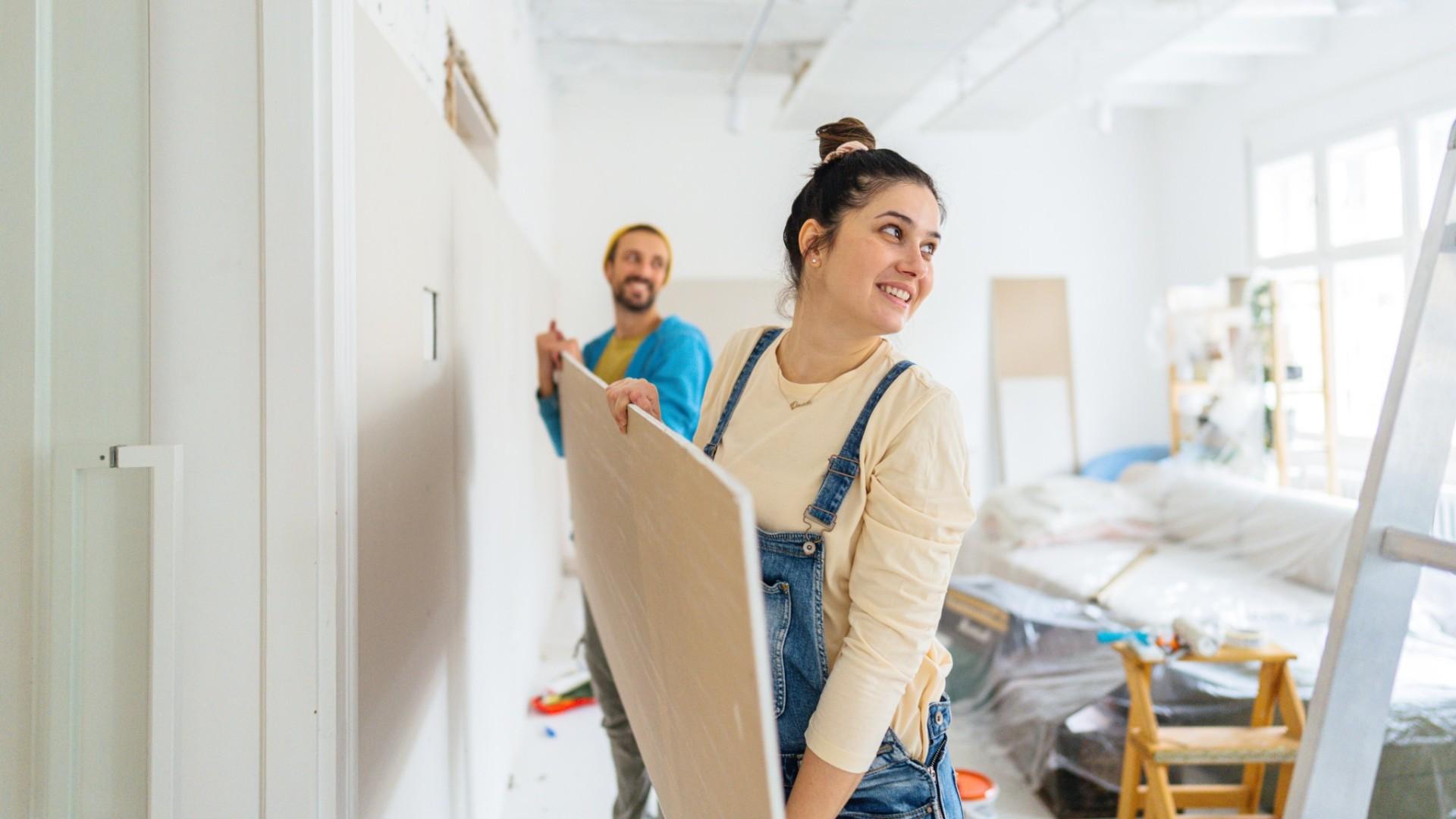 A happy couple is renovating their home.